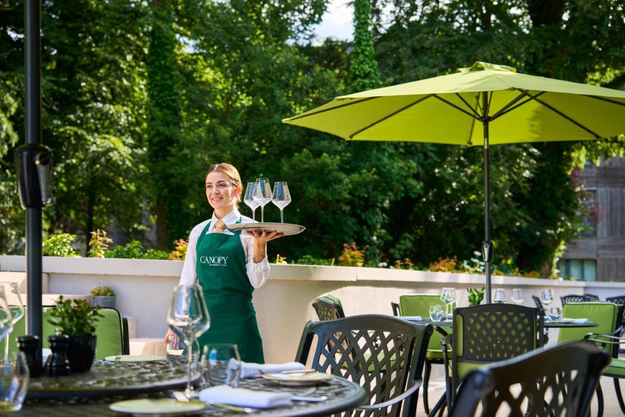 Castlemartyr Resort Hotel Eksteriør billede A waitress at the hotel